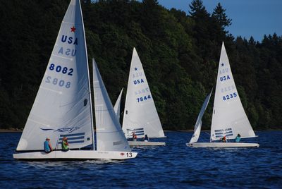 Heading upwind while two boats near the leeward mark.  I...
